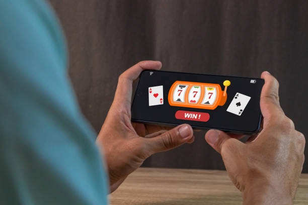 NetEnt game play on yugioh mobile app showing responsive design and game controls